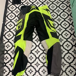 Fly Kinetic Dirt Bike Pants size 32 hood condition with dirt stains, no tears.